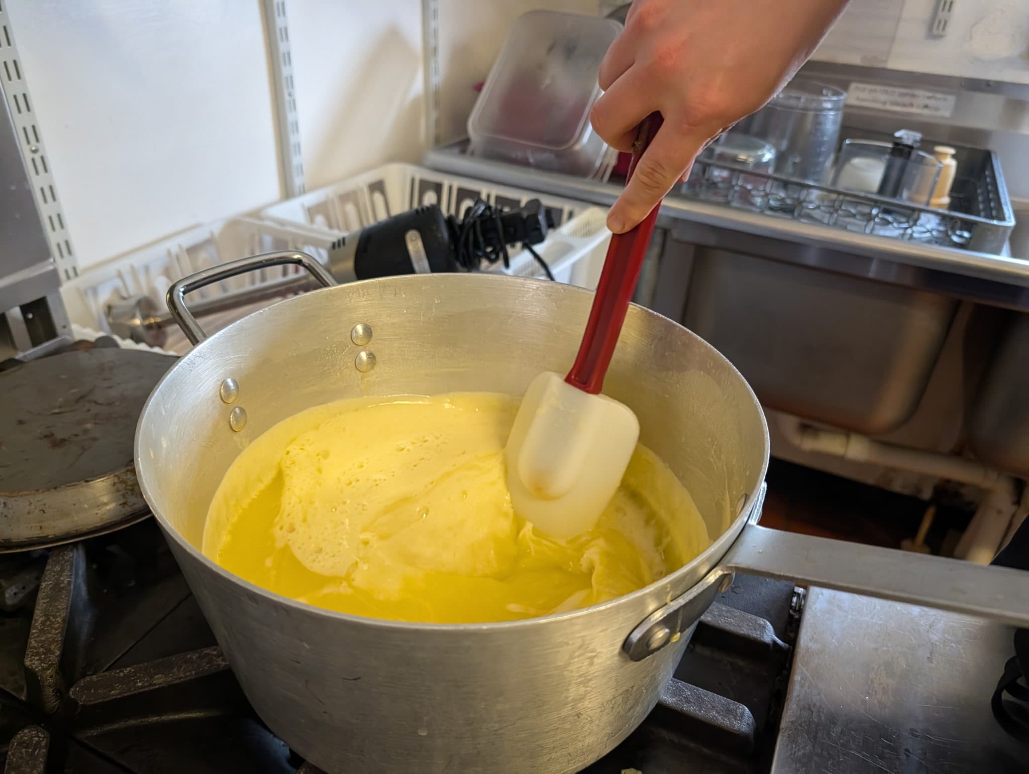 Lemon curd cooking in the pot